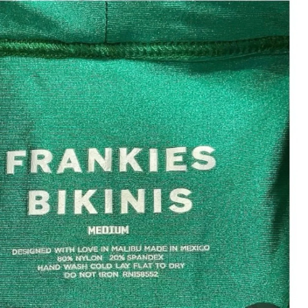 Frankie’s bikini SET-BOTH TOP AND BOTTOMS in emerald green. Size medium.
